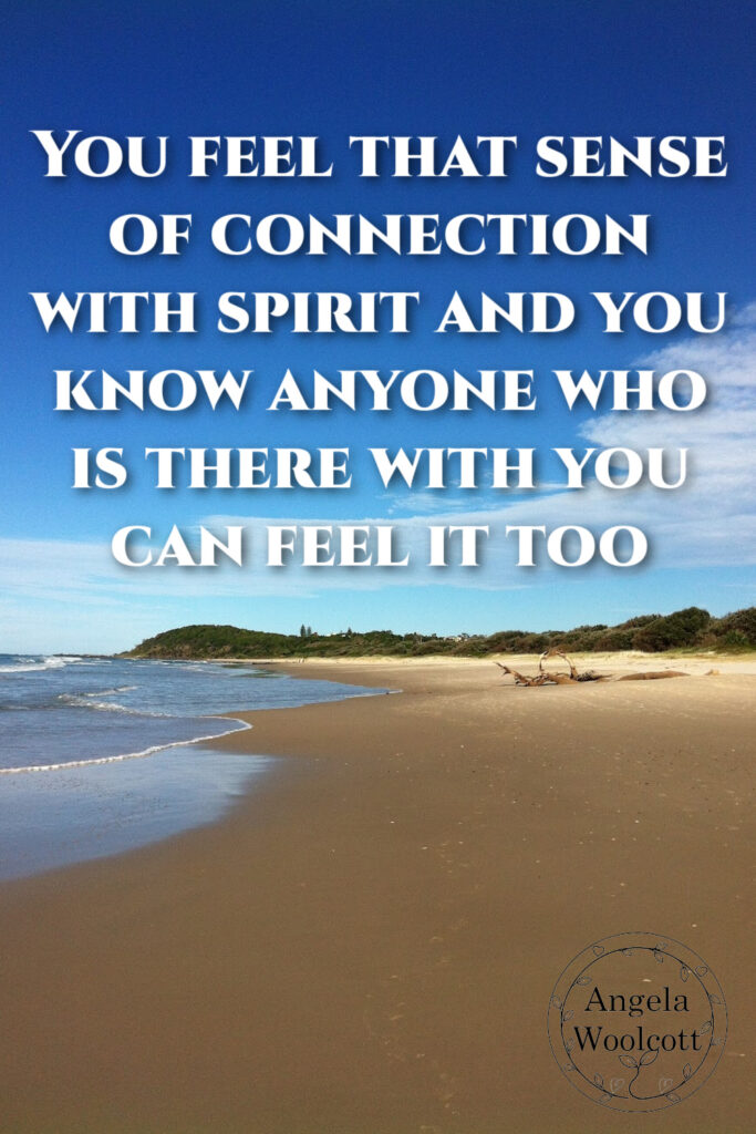 A golden beach, in shade, edge of the water, blue sky and a positive quote.