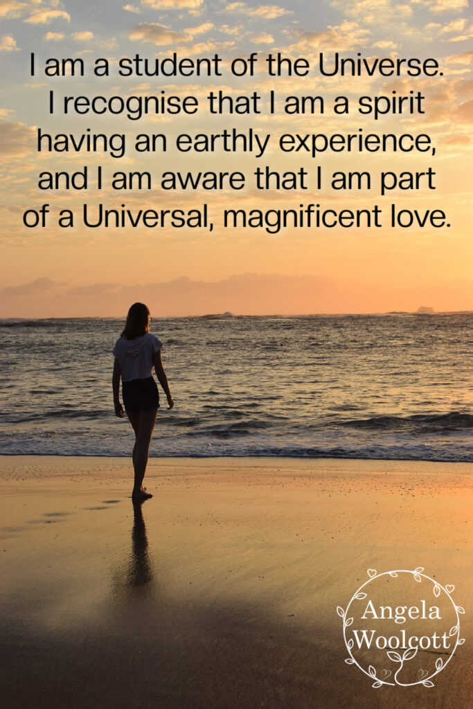 A silhouette of a woman on the beach walking towards the ocean at sunset with a positive quote.
