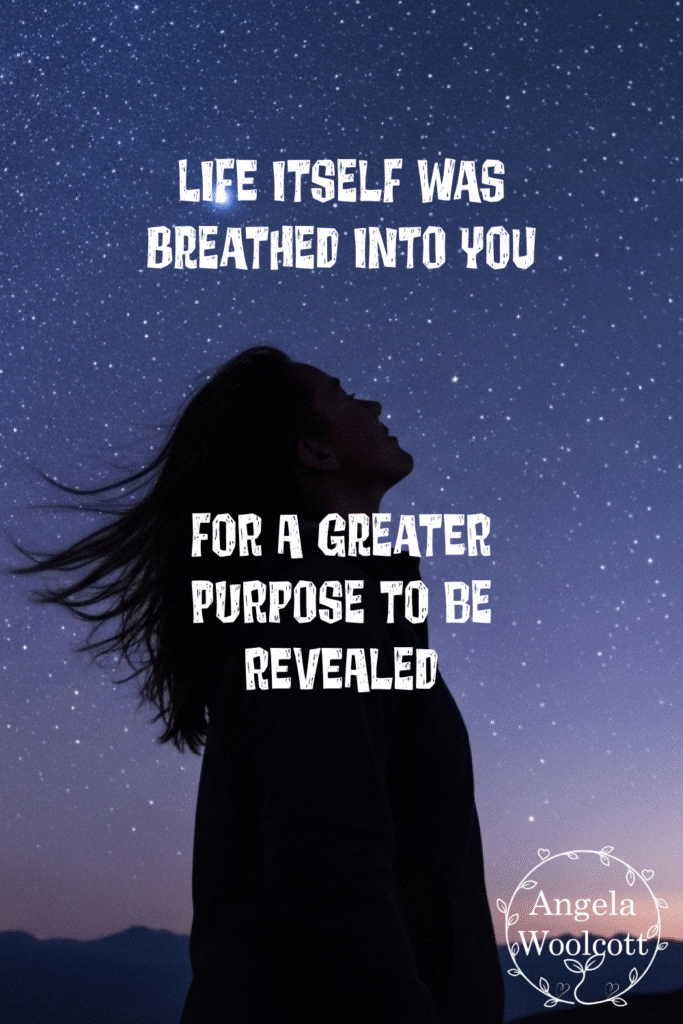 Woman staring up at the stars in the night sky with a positive spiritual quote.