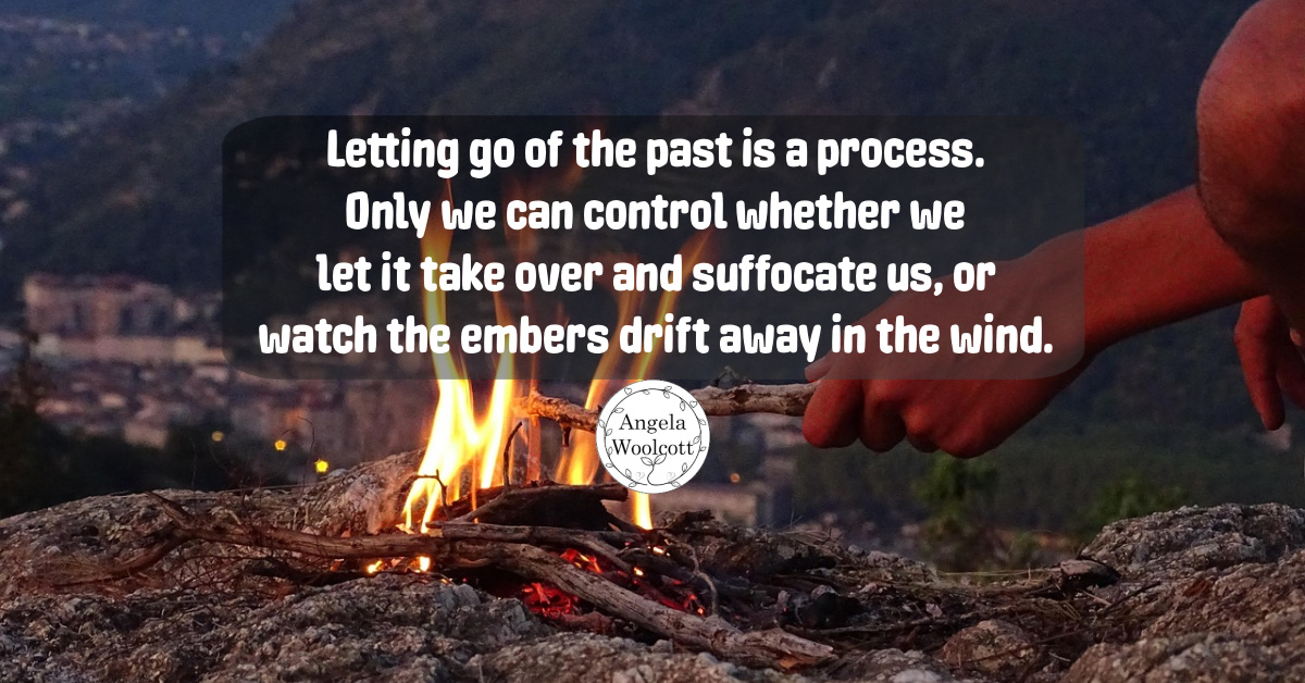fire stick camp ash meme positive quote featured.jpg Hand holding a stick over a campfire with a positive quote.